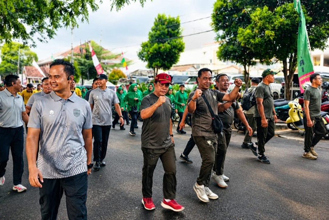 Semarak HUT ke-1 KODAM XXI/Radin Inten, Danramil 421-09/TJB Bersama Anggota Ikuti Jalan Sehat di Saburai