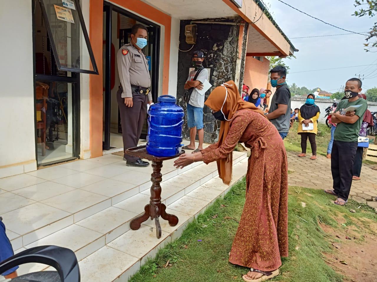 Polres Lampura Amankan Pembagian BST Tahap II di Sejumlah Titik