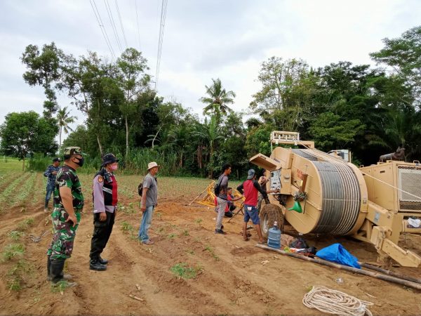 Kodim dan Polres Lampung Utara Kawal Proyek Lanjutkan Sutet di Desa Surakarta Dua Bulan Terhalang Tuntutan Konvensasi Empat Warga