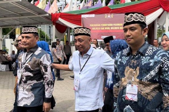 Tagline Mubaroq, Iman Santoso Dan M Rafieq Adi Pradana Daftar KPU Kota Metro